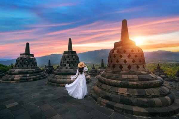 Tourist,Visiting,In,Ancient,Largest,Buddhist,Borobudur,Temple,At,Sunrise Borobudur Temple, Prambanan Temple, and Ramayana Ballet (no dinner included)
